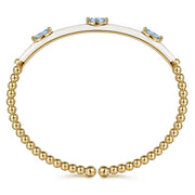 14K Yellow Gold Bujukan Blue Topaz Split Bangle with White Enamel - 2024 Christmas Catalog Pg. 3